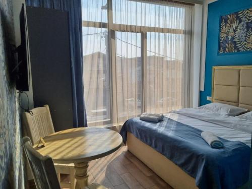 Кровать или кровати в номере Days Hotel