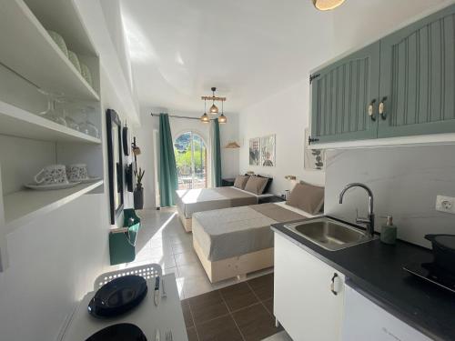 Gambar di galeri bagi Olive Studio ,Balcony with Mountain View, Kitchenette, 1km to Beach ,by likeyourhome di Ermones
