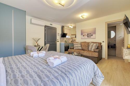 a bedroom with a bed with two towels on it at Nafplia Castle in Nafplio