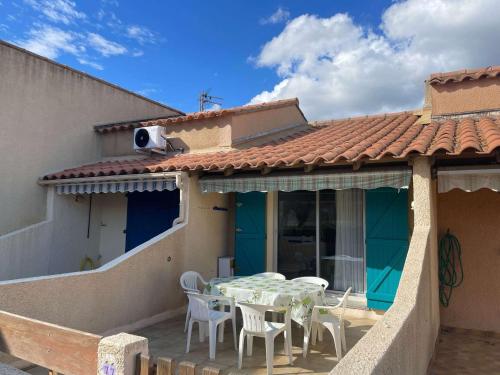 Maison de vacances, séjour cuisine, résidence MAS DE LA PLAGE 1, terrasse Sud dégagée 4 couchages Portiragnes LRMP77