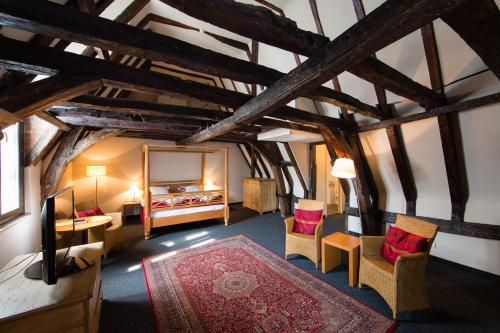 Postel nebo postele na pokoji v ubytování Ghent River Hotel