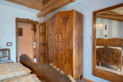 Ένα ή περισσότερα κρεβάτια σε δωμάτιο στο Agriturismo Alpenvidehof