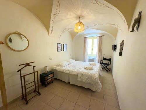 Ein Bett oder Betten in einem Zimmer der Unterkunft Sardinian Gallery Seminario