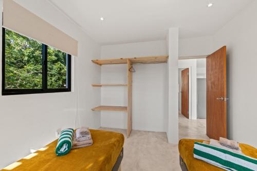 a living room with a couch and a window at SERU40 Apartment 1 in Willemstad