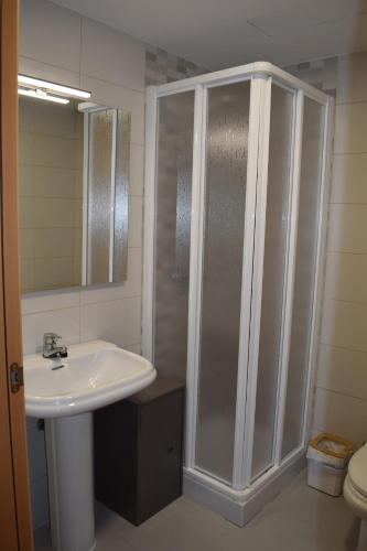 a bathroom with a shower and a sink at Benissanet Tarragona Apartment Cal Sanet in Benissanet