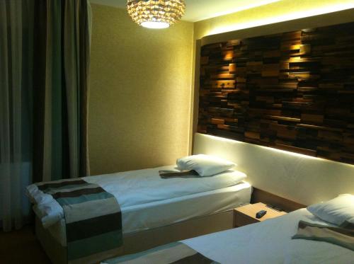 Ayderoom Hotelにあるベッド