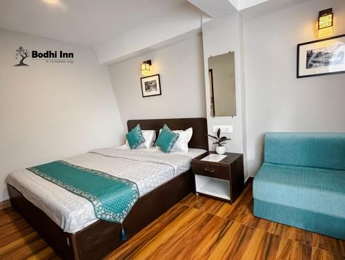 Postel nebo postele na pokoji v ubytování Bodhi Inn Homestay