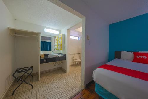 Ένα ή περισσότερα κρεβάτια σε δωμάτιο στο OYO Hotel St Helens OR