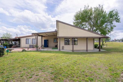 a house with a large yard in front of it at OYO Hotel Daleville AL Hwy 84 in Daleville