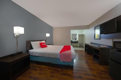 Ένα ή περισσότερα κρεβάτια σε δωμάτιο στο OYO Hotel St Helens OR