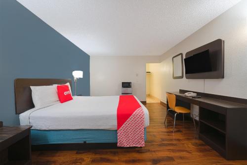 Ένα ή περισσότερα κρεβάτια σε δωμάτιο στο OYO Hotel St Helens OR
