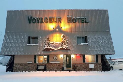 a view of a vancouver hotel in the snow at Love Hotels Voyageur by OYO at International Falls MN in International Falls