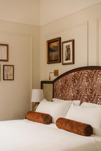 Voodi või voodid majutusasutuse Hotel Fleur de Ville toas