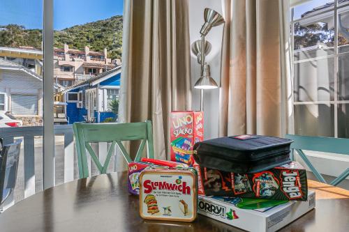 a table with snacks and a suitcase on top of it at 339CL 339 Claressa in Avalon