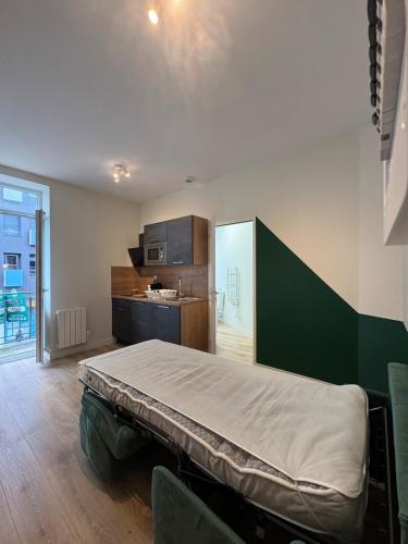 Photo de la galerie de l'établissement Cosy Studio 59 Lafayette tout équipé N1, à Clermont-Ferrand