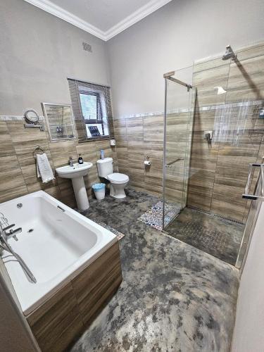 Koupelna v ubytování Apricity Inn