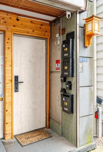 an entrance to a building with a door at 上野日式民宿 in Tokyo