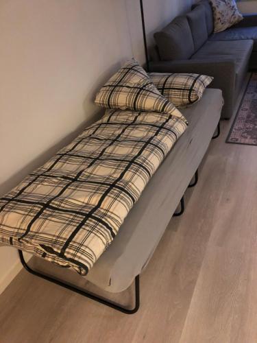 Postel nebo postele na pokoji v ubytování Flott leilighet midt i Tromsø sentrum med 5 voksne sengeplasser