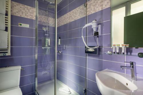 Ванная комната в Hôtel WYLD Saint Germain