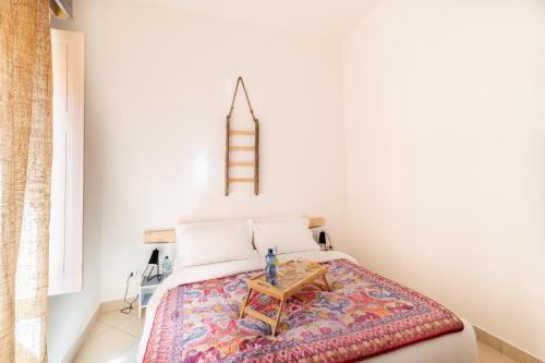 Una cama o camas en una habitación de Elsa d'Ortigia
