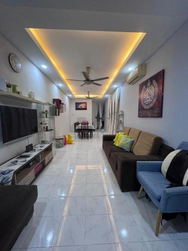 Телевизор и/или развлекательный центр в H&A Homestay Bandar Tasek Mutiara