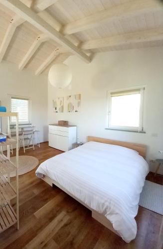 Postel nebo postele na pokoji v ubytování Agriturismo Timignano