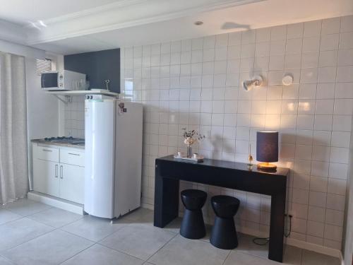 Køkken eller tekøkken på Mediterrâneo flat 1309