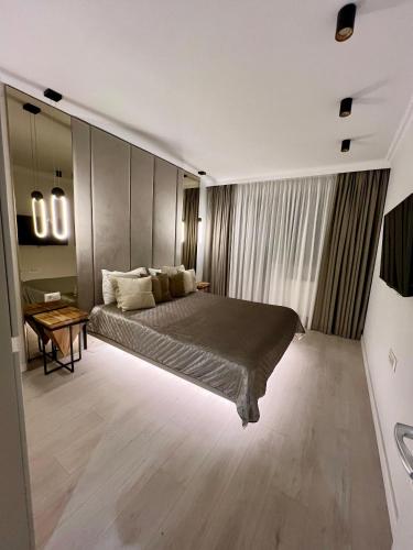 Katil atau katil-katil dalam bilik di Hils Hotel Apartment by Warm