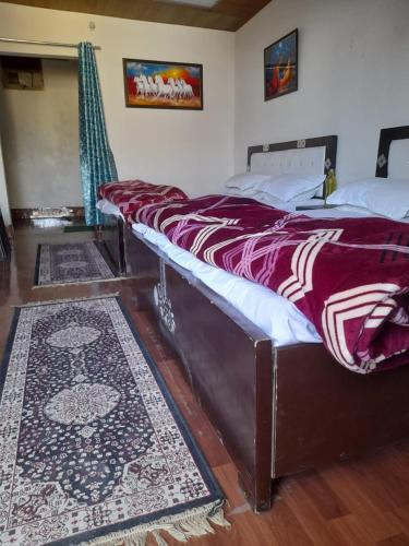 Cama o camas de una habitación en Hotel Ved Bageshwari