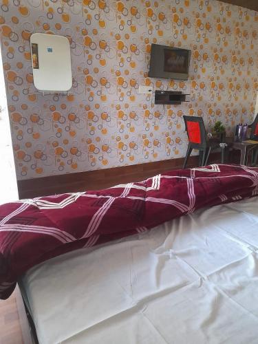 Cama o camas de una habitación en Hotel Ved Bageshwari