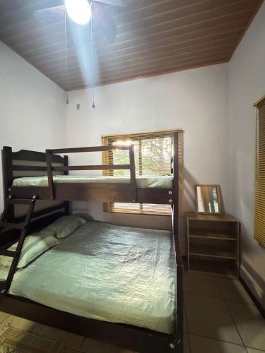 Postel nebo postele na pokoji v ubytování Casa Mangos Macondo Lepanto