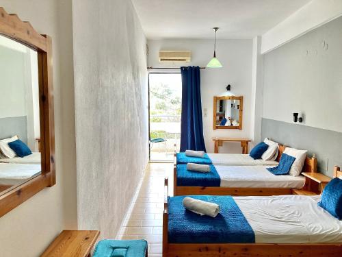 Postel nebo postele na pokoji v ubytování Eleana Apartments