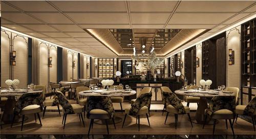 a black and white photo of a restaurant with tables and chairs at InterContinental Halong Bay Resort by IHG in Ha Long