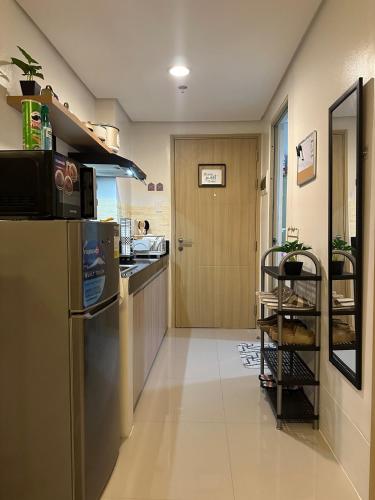 Dapur atau dapur kecil di CK Suites Staycation at Vine Residences by SMDC
