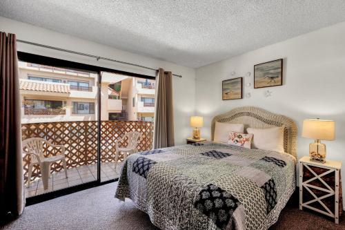 En eller flere senge i et værelse på Bahia Vista A10