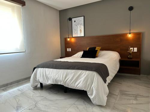 Postel nebo postele na pokoji v ubytování Pachamaya Holistic Wellness & Spa