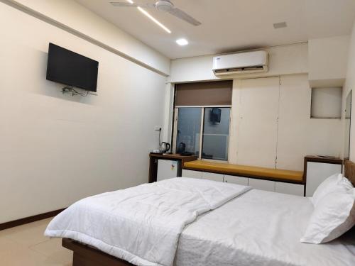 Postel nebo postele na pokoji v ubytování Hotel Spark Inn