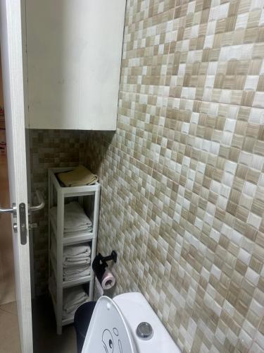 a bathroom with a sink and a toilet in it at Appartement de lux avec piscine in Mohammedia