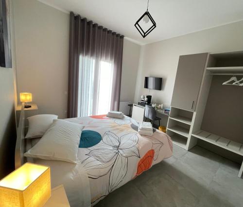 Ένα ή περισσότερα κρεβάτια σε δωμάτιο στο LA CASA DI AGEA