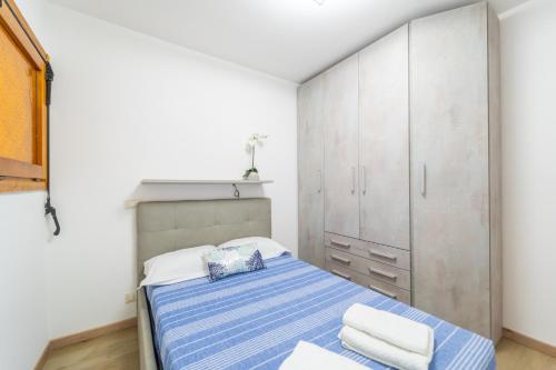 Postel nebo postele na pokoji v ubytování SMERALDA Green
