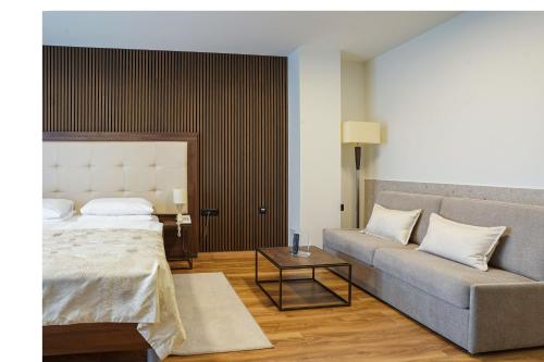 Postel nebo postele na pokoji v ubytování Hotel Degenija