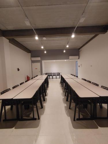 a large room with tables and chairs in it at Best Guest Hotel Expo Anhembi in Sao Paulo