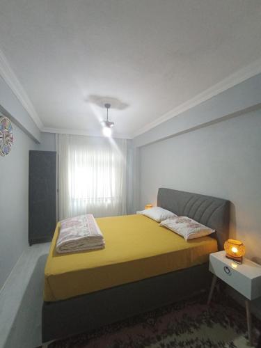 Katil atau katil-katil dalam bilik di Manzaram tatil evi
