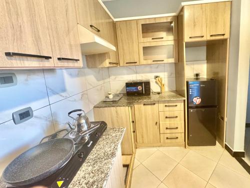 Kuchyň nebo kuchyňský kout v ubytování Bright apartments prime location and easy access 2