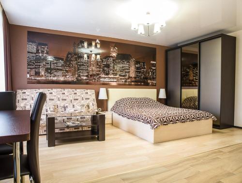 Ένα ή περισσότερα κρεβάτια σε δωμάτιο στο Kharkiv Apartments on Nauky avenue