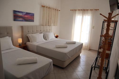 Ένα ή περισσότερα κρεβάτια σε δωμάτιο στο Pension St.George Rooms & Studios