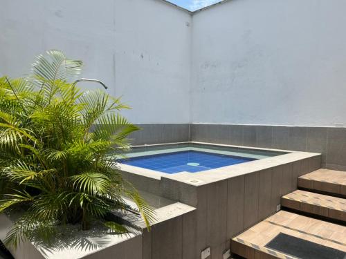 Bazén v ubytování Hotel 79 Poblado nebo v jeho okolí