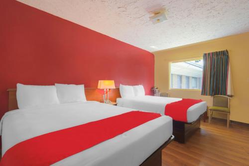 Ένα ή περισσότερα κρεβάτια σε δωμάτιο στο OYO Hotel North Lima OH - Boardman