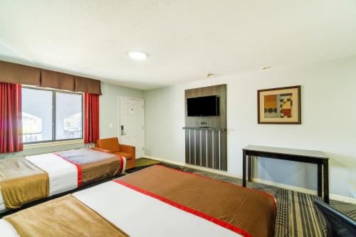 High Five Inn By OYO Killeenにあるベッド