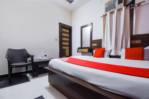 Ένα ή περισσότερα κρεβάτια σε δωμάτιο στο Hotel O Pearl Motichur Railway station